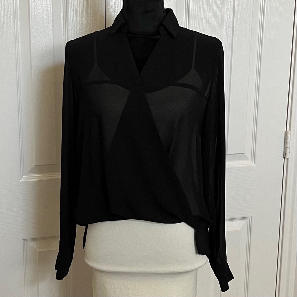 Divided semi-sheer black top